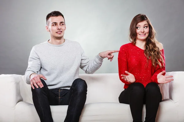 Shy woman and man sitting on sofa. First date. — Stock Photo, Image