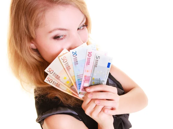 Economy finance. Woman holds euro currency money. Stock Image