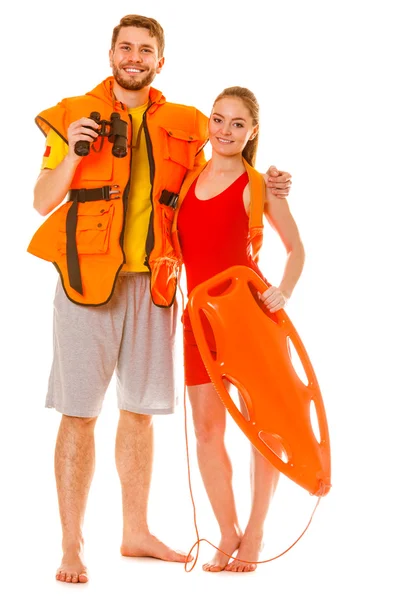 Salvaguardas em colete salva-vidas com bóia de resgate . — Fotografia de Stock