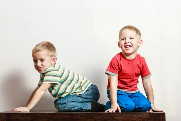 Little boys have fun together at home. — Stock Photo, Image