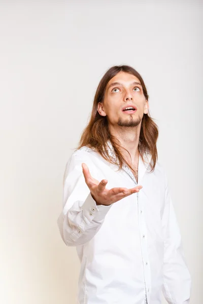 Joven haciendo gesto de captura . — Foto de Stock