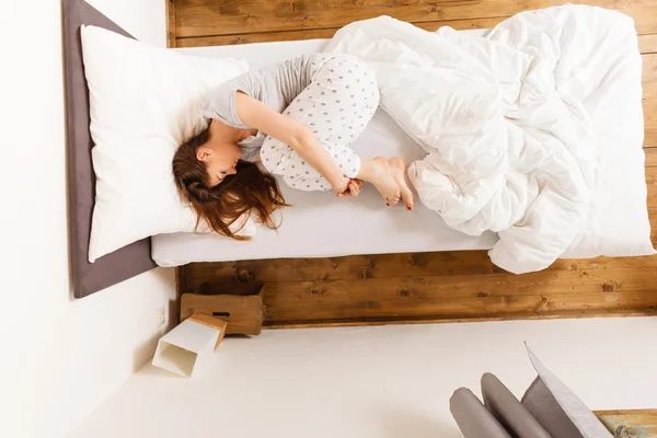 Sleepy woman sleeping in the bed. — Stock Photo, Image