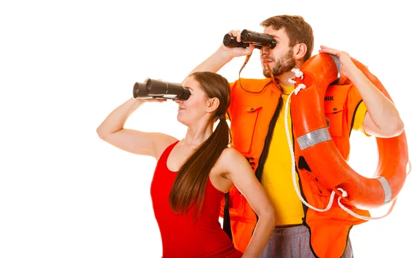 Lifeguards with ring buoy and life vest. — Stockfoto