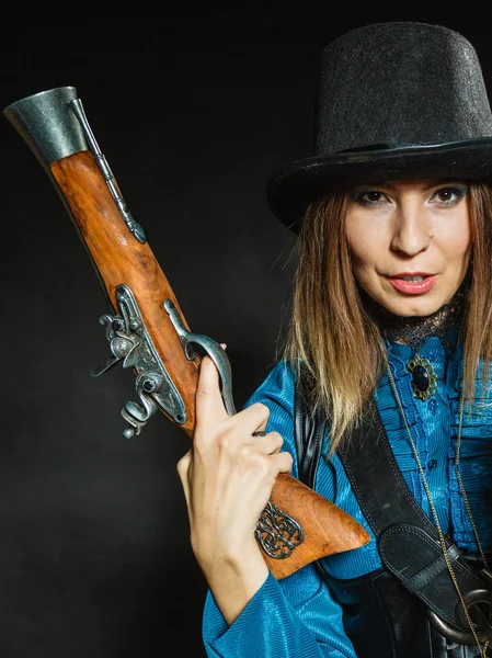 Steampunk with old retro camera and pistol. — Stock Photo, Image