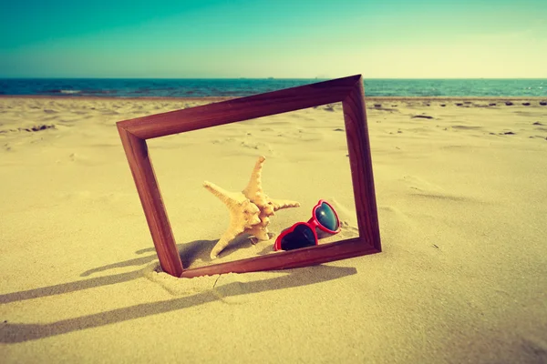 Frame on sand on the beach. — Stock Photo, Image