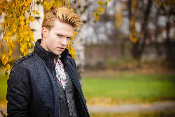 Young handsome man outdoors — Stock Photo, Image