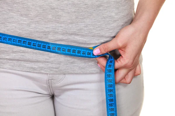 Woman measuring her hips closeup — Stock Photo, Image