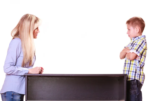 Mother and son talk and argue sit at table. — Stock Photo, Image