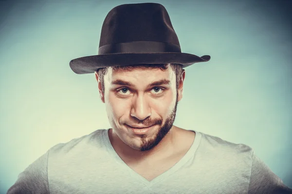 Happy man with half shaved face beard hair in hat. — Stock Photo, Image