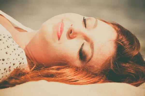 Red haired girl outdoor on beach — Stock Photo, Image