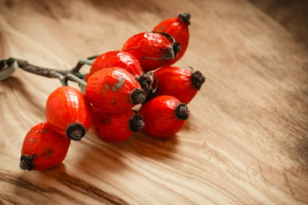 Hawthorn on wooden table background — Stock Photo, Image