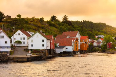 Wooden houses in Sogndalstrand Norway clipart