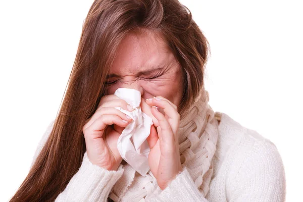 Sick woman girl with fever sneezing in tissue — Stock Photo, Image