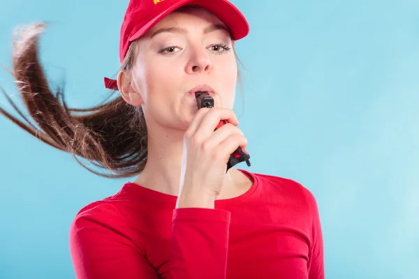 Lifeguard woman in cap on duty blowing whistle. — Stock Photo, Image