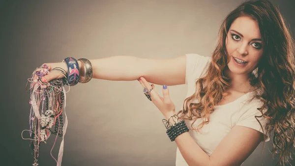 Pretty woman with jewelry necklaces ring bracelets — Stock Photo, Image