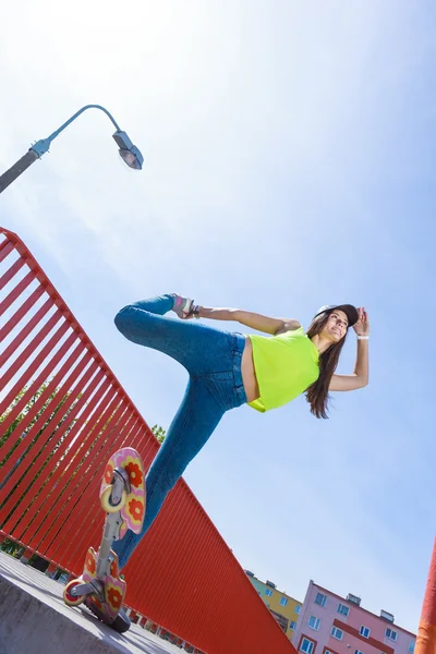 Teen girl skater riding skateboard on street. — Stock Photo, Image