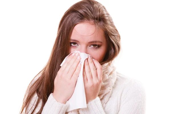 Sick woman girl with fever sneezing in tissue — Stock Photo, Image