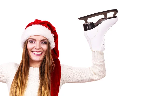 Woman santa claus with ice skates — Stock Photo, Image