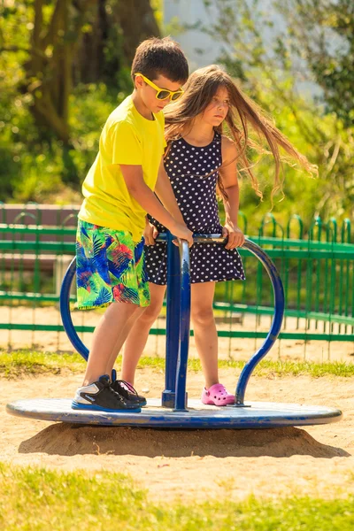 Kids having fun on playground. — Stock Photo, Image