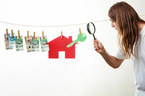 Man seller with money and house — Stock Photo, Image