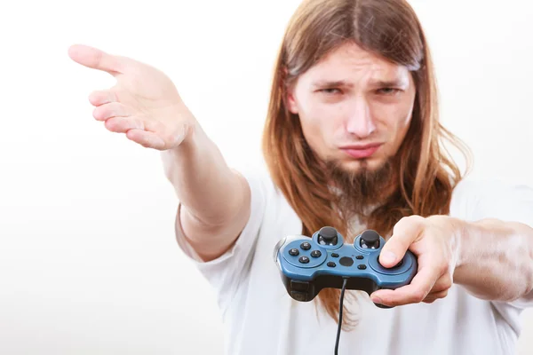 Unhappy male playing games — Stock Photo, Image
