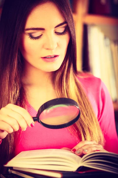 Hipster girl holding magnifying glass — Stock Photo, Image