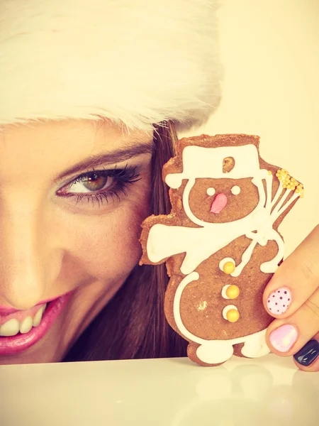 Sombrero Santa Claus mujer con galleta de jengibre. Navidad —  Fotos de Stock