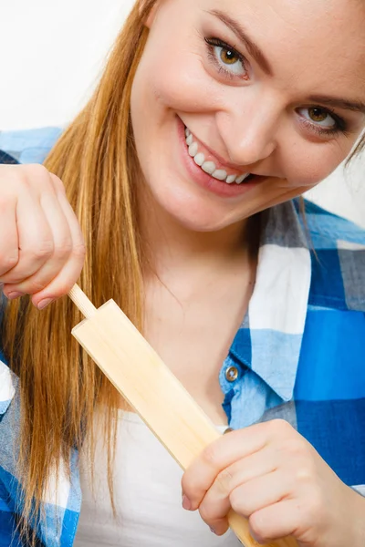 Woman assembling wooden furniture. DIY. — Stock Photo, Image