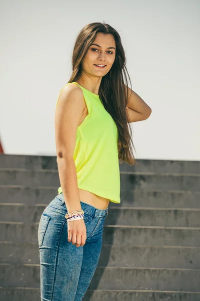 Girl on stairs in city. — Stock Photo, Image