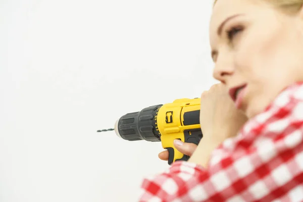 Young Woman Checked Shirt Using Drill Her Work Home Girl Stock Picture