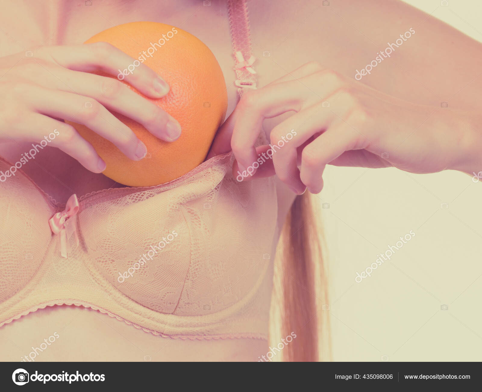 Slim Young Woman Small Boobs Puts Big Orange Fruit Her Stock Photo