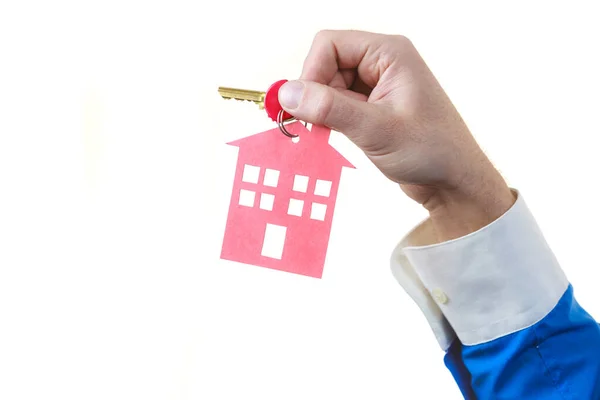 Closeup Male Hand Holding New House Key Red Home Shape — Stock Photo, Image