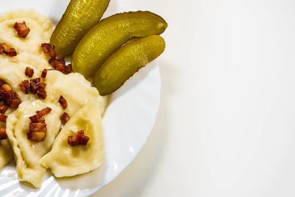 Close Dumplings Sprinkled Meat Bacon Scratchings Pickled Cucumbers Traditional Polish — Stock Photo, Image