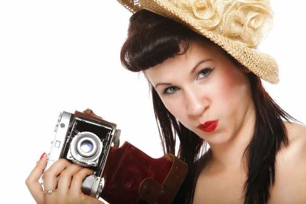 Pretty retro girl in hat with vintage camera — Stock Photo, Image