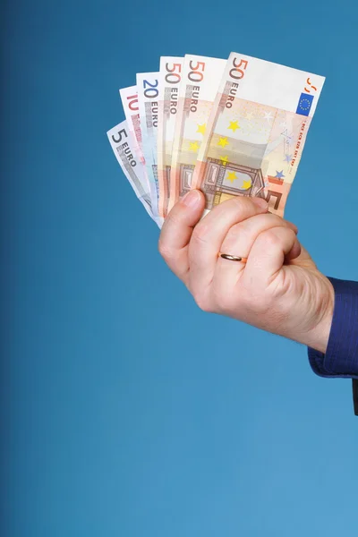 Euro banknotes in male hand Royalty Free Stock Images