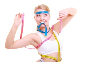 Obsessed fitness woman with a lot of colorful measure tapes clipart