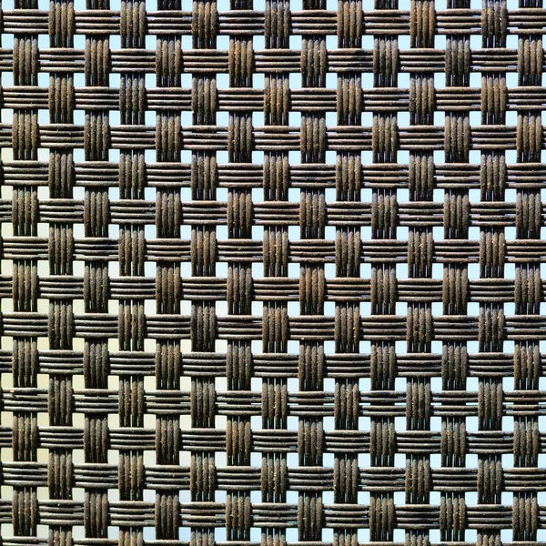 Black plastic weave as woven background texture — Stock Photo, Image