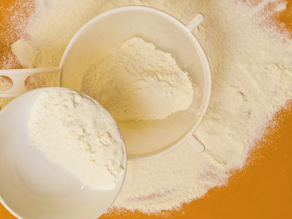 Preparation for baking, ingredients flour sifting. — Stock Photo, Image