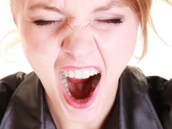 Angry furious woman screaming and pulling messy hair — Stock Photo, Image