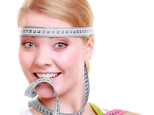 Obsessed girl with gray measure tapes around her head — Stock Photo, Image