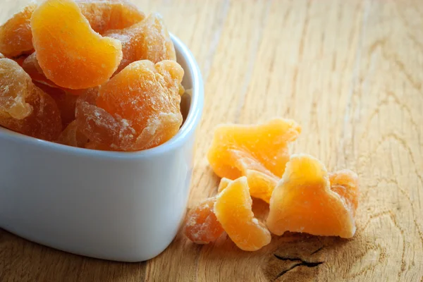 Candied dried ginger in bowl — Stock Photo, Image