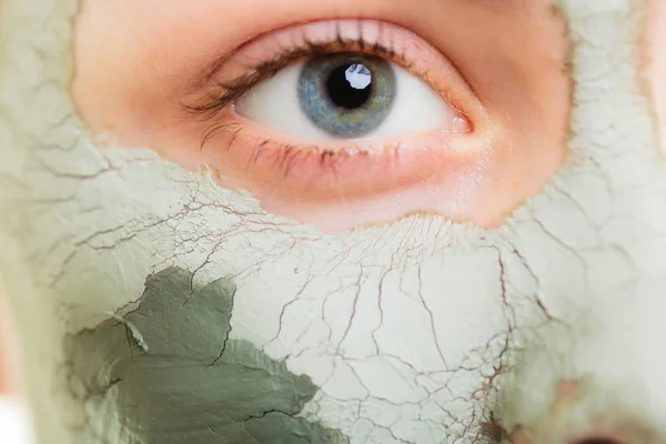 Woman in clay mud mask — Stock Photo, Image