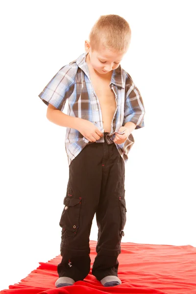 Little boy buttoning on shirt — Stock Photo, Image