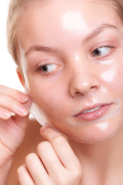 Woman in facial peel off mask — Stock Photo, Image