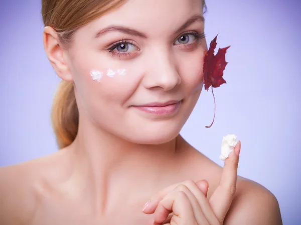 Woman with red maple leaf — Stock Photo, Image