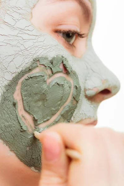 Woman in clay mud mask — Stock Photo, Image