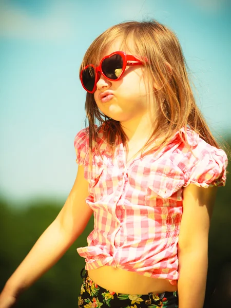 Girl kid in red sunglasses — Stock Photo, Image