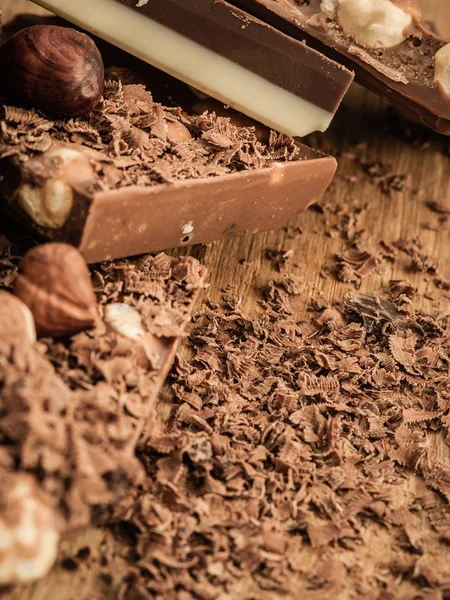 Diversi tipi di cioccolato e trucioli . — Foto Stock