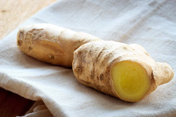 Fresh raw ginger on table — Stock Photo, Image
