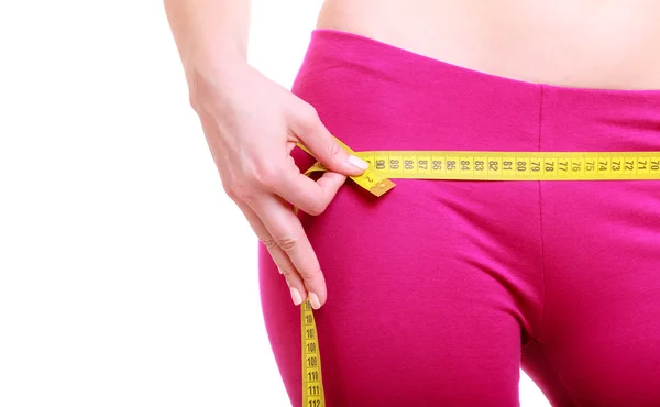 Fitness woman with measure tape — Stock Photo, Image